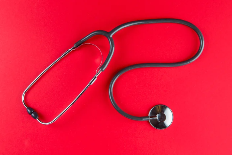 Medical device on a red background symbolizes cooperation with the medical segment of business.