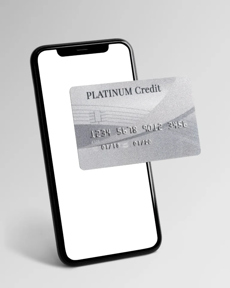 Smartphone with a white screen, credit card close by. Symbolizing payment terms.